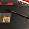 DMT vape pen with vapor, symbolizing a transformative, powerful psychedelic experience, highlighting both the benefits and potential risk